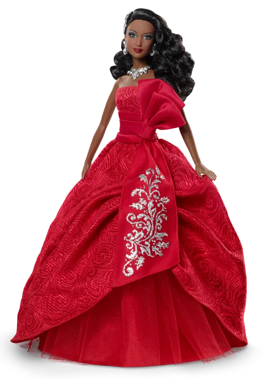 Modepuppe im roten Kleid