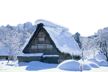 Snow-Covered Traditional Wooden House